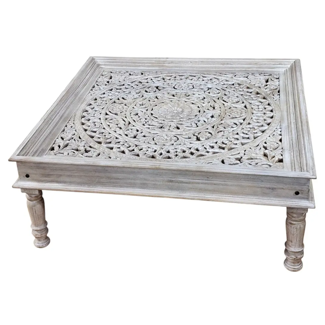 The Shanti Mandala Carved Glass-Top Coffee Table