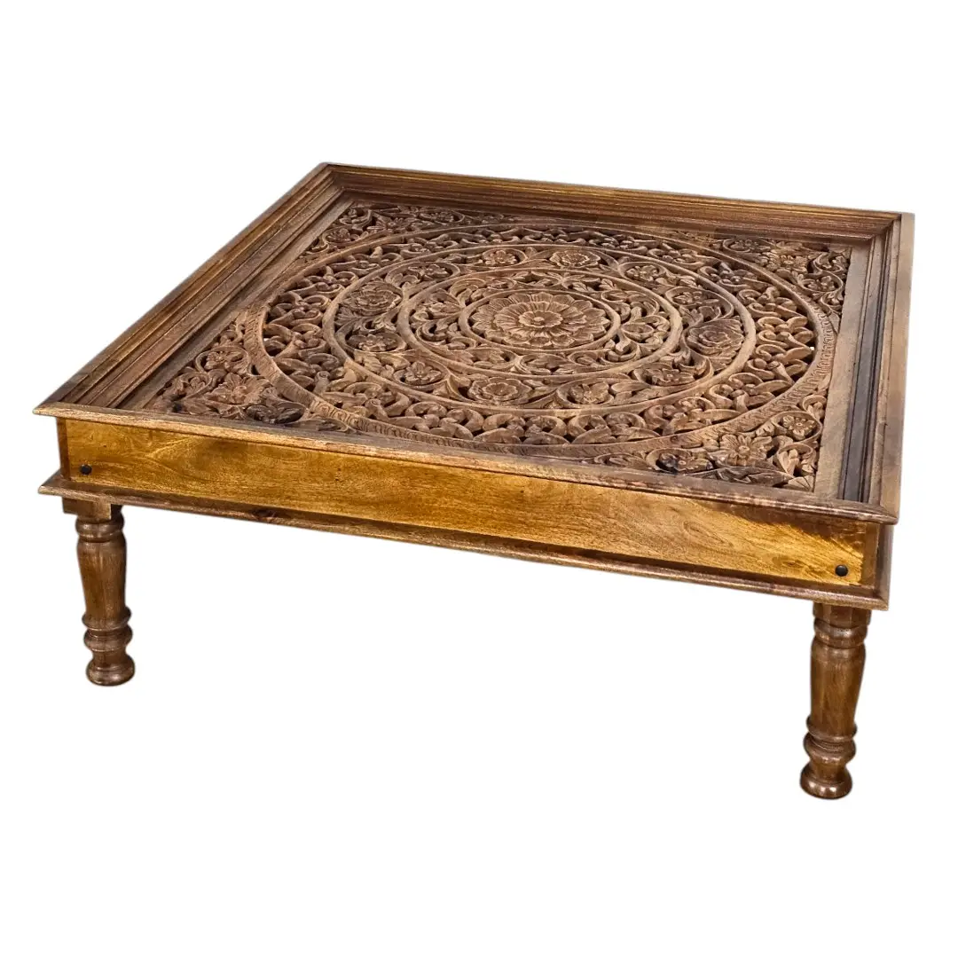 The Shanti Mandala Carved Glass-Top Coffee Table