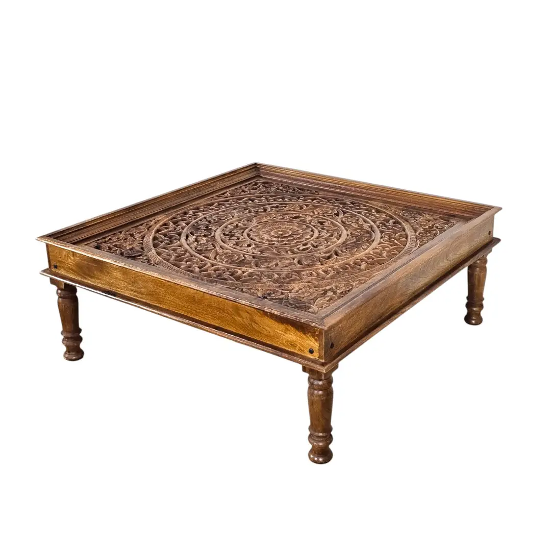 The Shanti Mandala Carved Glass-Top Coffee Table