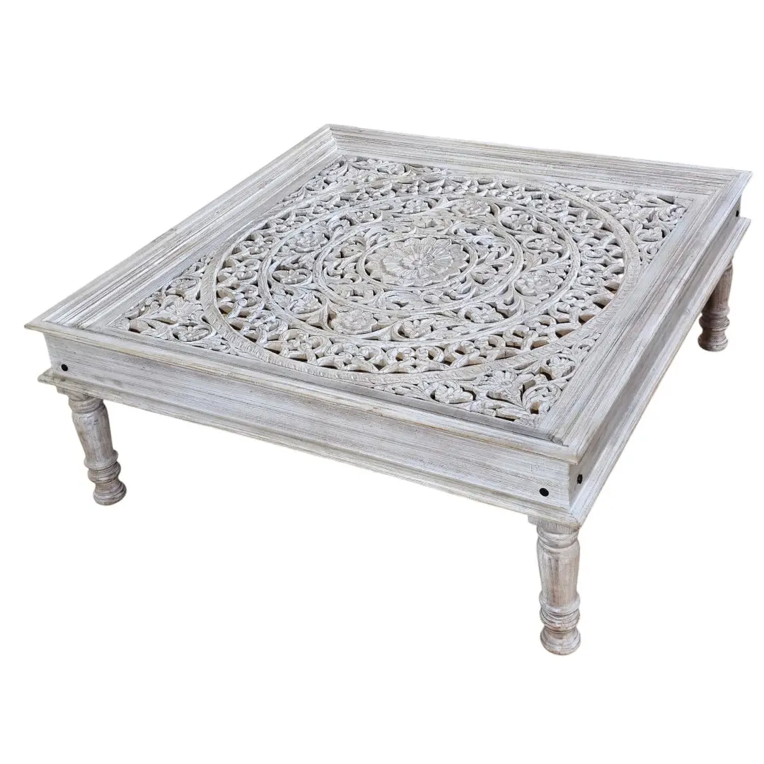 The Shanti Mandala Carved Glass-Top Coffee Table