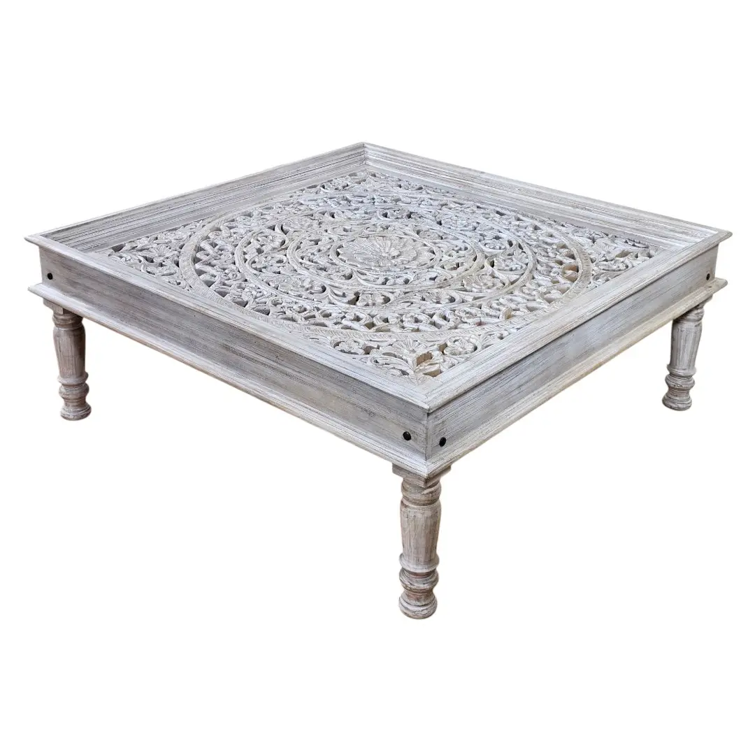 The Shanti Mandala Carved Glass-Top Coffee Table